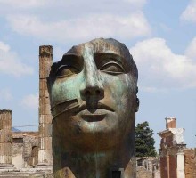 A sculpture amid the ruins of the ancient city of Pompeii