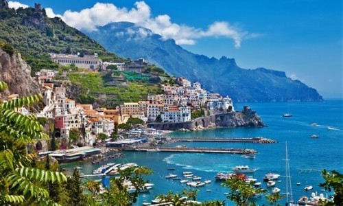 Morning view of Amalfi cityscape on coast line of mediterranean sea, Italy