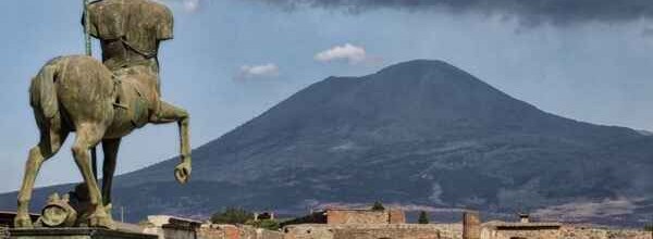 Front view of pompeii ruins in Italy.Mount Vesuvius shown in the backgraound.